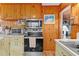 Kitchen boasts stainless steel appliances and wood details at 39200 Cook Brown Rd, Punta Gorda, FL 33982