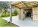 Workshop area with storage and workbenches at 39200 Cook Brown Rd, Punta Gorda, FL 33982
