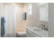 Bathroom with marble vanity and shower/tub combo at 4166 Corte La Vista Vis, Sarasota, FL 34238