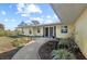 Inviting front entrance with landscaping and walkway at 4191 Strombus Rd, Venice, FL 34293