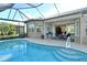 Sparkling screened pool and spa with a view at 4422 Legacy Ct, Sarasota, FL 34241