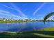 Scenic view of a tranquil lake with lush greenery at 4511 Lexington Cir, Bradenton, FL 34210