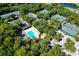 Aerial view of tennis courts and pool area at 4532 Longwater Chase # 37, Sarasota, FL 34235