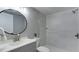 Updated bathroom with gray vanity and walk-in shower at 4532 Longwater Chase # 37, Sarasota, FL 34235