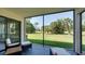 Spacious screened patio overlooking a lush golf course at 4532 Longwater Chase # 37, Sarasota, FL 34235