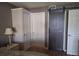 Main bedroom with barn door and double closets at 4750 Brittany S Dr # 24, St Petersburg, FL 33715