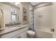 Bathroom with a shower/tub combo and updated fixtures at 4758 Tortona Ct, Lakewood Ranch, FL 34211