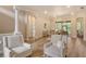 Open-concept living space with views to dining room and comfortable seating area at 5097 Faberge Pl, Sarasota, FL 34233