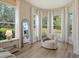 Serene sitting area with bay windows and ample natural light at 5097 Faberge Pl, Sarasota, FL 34233