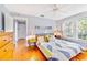 Main bedroom with hardwood floors and window at 514 Riverside E Dr, Bradenton, FL 34208