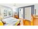 Bedroom with hardwood floors and built-in TV at 514 Riverside E Dr, Bradenton, FL 34208