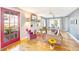 Bright living room with hardwood floors, fireplace, and comfy seating at 514 Riverside E Dr, Bradenton, FL 34208