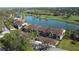 Aerial view of condo community near a lake and golf course at 5261 Mahogany Run Ave # 624, Sarasota, FL 34241