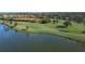 Aerial view of golf course and lake at 5261 Mahogany Run Ave # 624, Sarasota, FL 34241