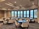 Bright dining room with lake views at 5261 Mahogany Run Ave # 624, Sarasota, FL 34241