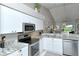 Modern kitchen with stainless steel appliances and granite countertops at 5261 Mahogany Run Ave # 624, Sarasota, FL 34241