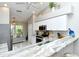 Updated kitchen featuring stainless steel appliances and granite countertops at 5261 Mahogany Run Ave # 624, Sarasota, FL 34241