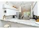 Modern kitchen with stainless steel appliances and granite countertops at 5261 Mahogany Run Ave # 624, Sarasota, FL 34241