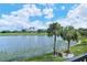 Enjoy peaceful lake views from this screened balcony at 5261 Mahogany Run Ave # 624, Sarasota, FL 34241