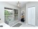 Home office with a large window, built-in shelving and closet at 5261 Mahogany Run Ave # 624, Sarasota, FL 34241