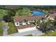 Aerial view of condo community near golf course and lake at 5281 Mahogany Run Ave # 822, Sarasota, FL 34241