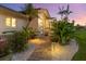 Well-lit walkway leading to a modern front entrance at 536 Ketch Ln, Longboat Key, FL 34228