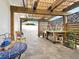 Covered patio with potting bench and sink, perfect for gardening at 536 Ketch Ln, Longboat Key, FL 34228