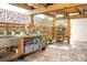 Spacious patio with wooden pergola and decorative plants at 536 Ketch Ln, Longboat Key, FL 34228