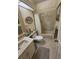 Clean bathroom with tub, shower, and updated vanity at 5492 Hampstead Heath # 11, Sarasota, FL 34235