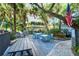 Community picnic tables and grills at 6047 E Peppertree Way # 224, Sarasota, FL 34242