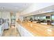 Well-equipped community kitchen with granite counters and appliances at 6047 E Peppertree Way # 224, Sarasota, FL 34242