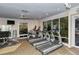 Fitness center with treadmills, elliptical machines, and strength training equipment at 6047 E Peppertree Way # 224, Sarasota, FL 34242