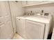 Convenient laundry room with washer and dryer at 6047 E Peppertree Way # 224, Sarasota, FL 34242