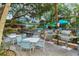 Outdoor grilling and dining area near the pool at 6047 E Peppertree Way # 224, Sarasota, FL 34242