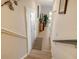 Elegant staircase leading to the upper level at 6047 E Peppertree Way # 224, Sarasota, FL 34242