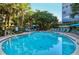Sparkling community pool perfect for relaxation at 6047 E Peppertree Way # 224, Sarasota, FL 34242