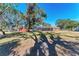 Spacious backyard with large trees and screened enclosure at 6300 26Th E Ave, Bradenton, FL 34208