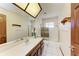 Bright bathroom with a vanity, toilet, and bathtub at 6300 26Th E Ave, Bradenton, FL 34208