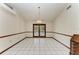 Bright dining room with tile floors and french doors at 6300 26Th E Ave, Bradenton, FL 34208