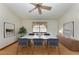 Elegant dining room with hardwood floors and modern furnishings at 6300 26Th E Ave, Bradenton, FL 34208