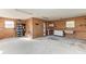 Large garage with workbench and storage shelves at 6300 26Th E Ave, Bradenton, FL 34208