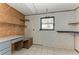Garage with built in cabinets and shelving at 6300 26Th E Ave, Bradenton, FL 34208