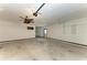 Spacious two-car garage with overhead storage and ample space at 6300 26Th E Ave, Bradenton, FL 34208