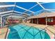 Large screened pool with spacious deck at 6300 26Th E Ave, Bradenton, FL 34208
