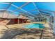 Enjoy this refreshing pool and screened enclosure at 6300 26Th E Ave, Bradenton, FL 34208