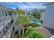 Aerial view of building, pool, and surrounding landscape at 6304 Pointe West Blvd # A306, Bradenton, FL 34209
