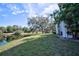 Spacious backyard with pond view and lush landscaping at 6304 Pointe West Blvd # A306, Bradenton, FL 34209