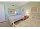 Guest bedroom with twin beds and mirrored closet at 6304 Pointe West Blvd # A306, Bradenton, FL 34209