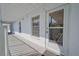 Building hallway with exterior door access to balcony at 6304 Pointe West Blvd # A306, Bradenton, FL 34209