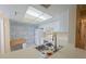 Bright kitchen with white cabinets and appliances at 6304 Pointe West Blvd # A306, Bradenton, FL 34209